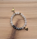 Kindersieraden: meisjes armband met naam model "Aurum" incl. 2 bedels naar keuze