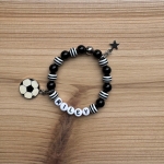 Kindersieraden: jongens armband met naam model "black and white"     