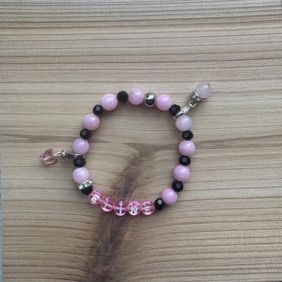 Kindersieraden: meisjes armband met naam zwart kristal inclusief 2 bedels 